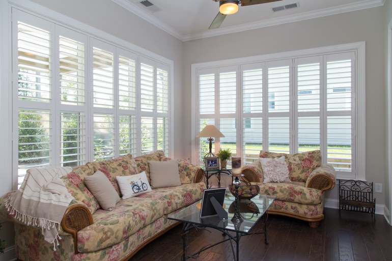 Traditional sunroom with faux wood shutters in Indianapolis.